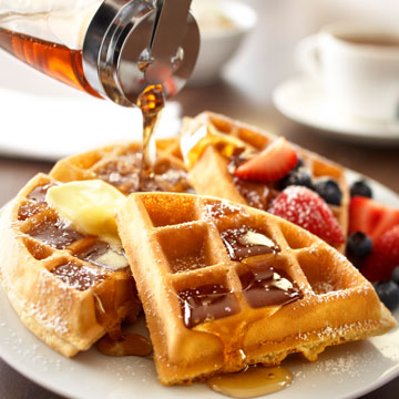 Does the Country Inn & Suites Asheville River Arts District offer breakfast?